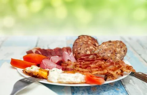 Breakfast with fried eggs and bacon Stock Photos