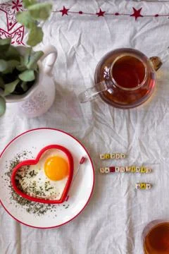 Breakfast Fried Eggs and Tea on Valentines Day Stock Photos