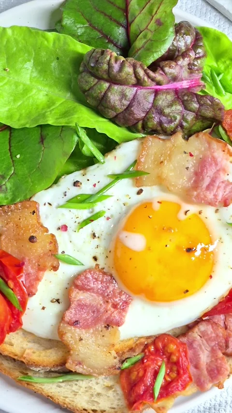 Breakfast.   fried eggs with bacon Stock Footage 304977467