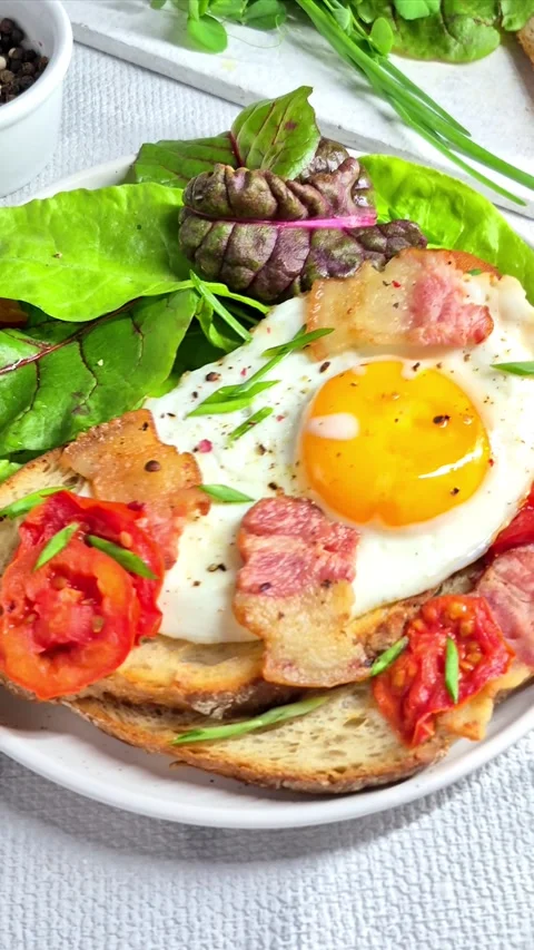 Breakfast.   fried eggs with bacon Stock Footage 304977468