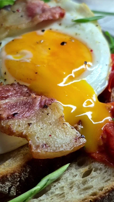 Breakfast.   fried eggs with bacon Stock Footage 304977469