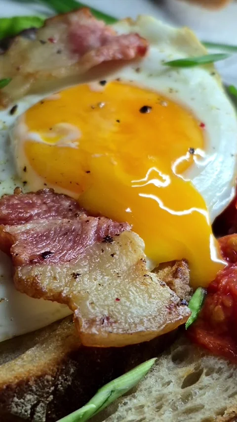 Breakfast.   fried eggs with bacon Stock Footage 304977479