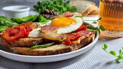 Breakfast.   fried eggs with bacon Stock Footage 304977638