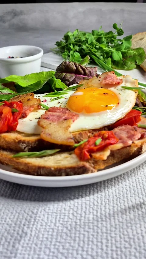 Breakfast.   fried eggs with bacon Stock Footage 304977794