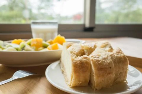 Breakfast with fruit and cake Stock Photos