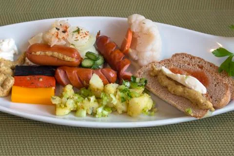A breakfast with a German accent. Stock Photos