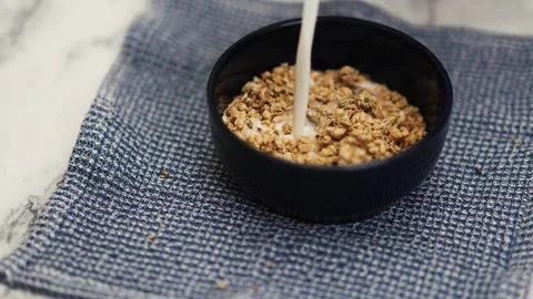 Breakfast Granola Cereal with Milk Stock Footage 247746360