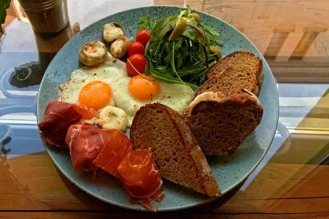 Breakfast of ham and eggs. Stock Photos