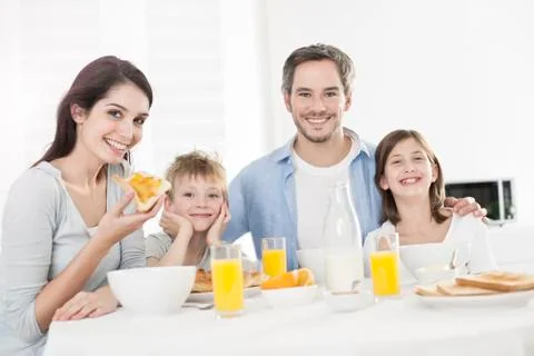Breakfast for an happy family Stock Photos