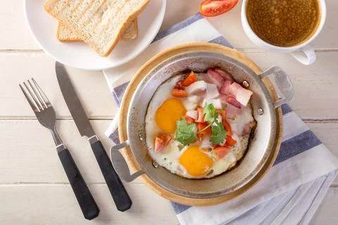 Breakfast including coffee, Egg pan, bread, Stock Photos