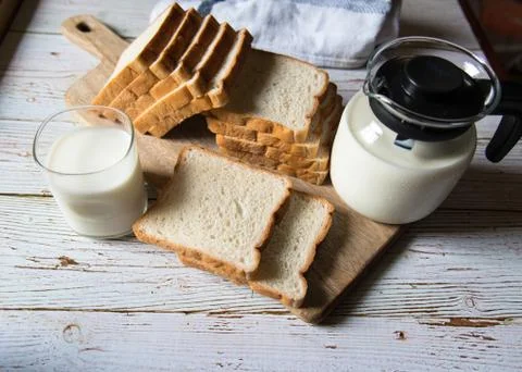 Breakfast items milk and bread Stock Photos