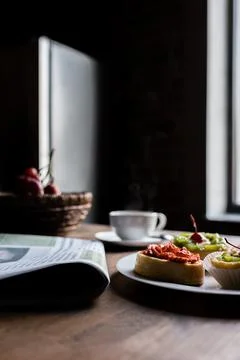 Breakfast on kitchen table Stock Photos
