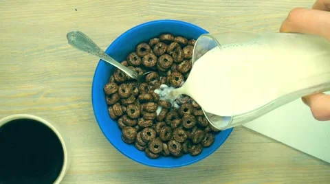 Breakfast with milk and flakes Stock Footage 68374602