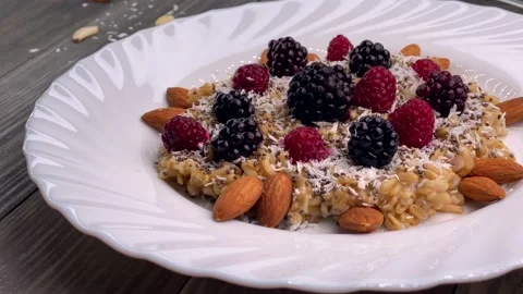 Breakfast Oatmeal Plate Berries. Stock Footage 149756740