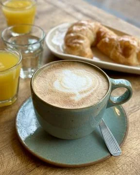 Breakfast or brunch table scene on a wooden background. Above view. Stock Photos