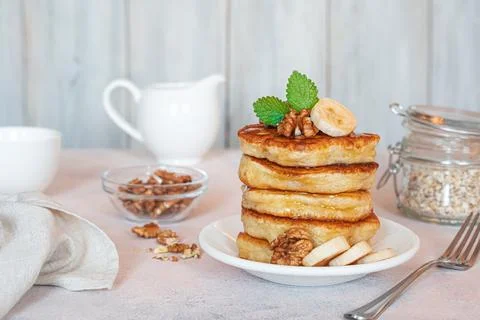 Breakfast with pancakes on a light background. Stock Photos