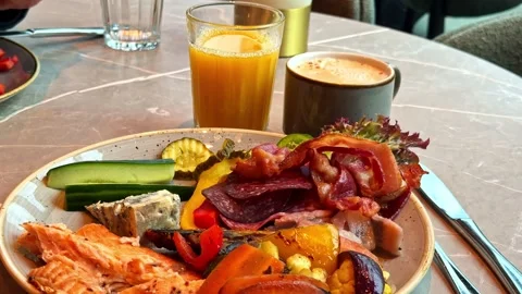 Breakfast Plate With Coffee and Juice on Restaurant Table Stock Footage 340306136