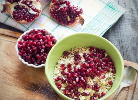 Breakfast with a pomegranate.. Stock Photos
