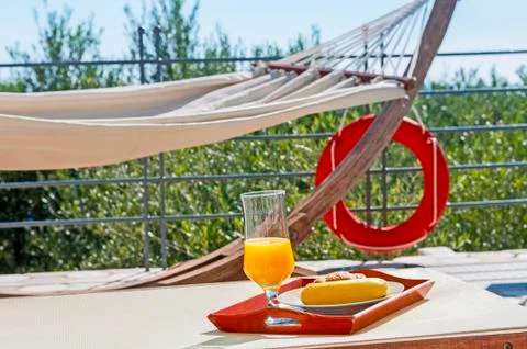 Breakfast at poolside during holidays Stock Photos