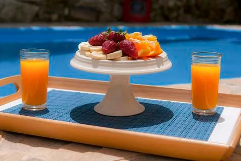 Breakfast in poolside Stock Photos