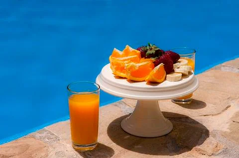 Breakfast in poolside Stock Photos