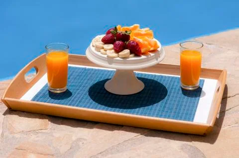 Breakfast in poolside Stock Photos