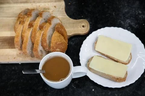 Breakfast preparation being prepared in a kitchen. Stock Photos