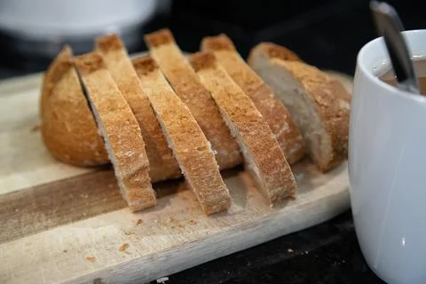 Breakfast preparation being prepared in a kitchen. Stock Photos