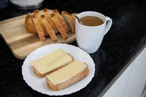 Breakfast preparation being prepared in a kitchen. Stock Photos
