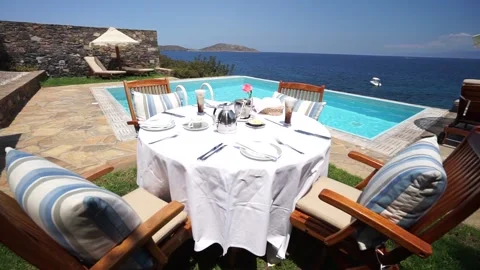 Breakfast on Private Poolside. Exclusive Luxury Resort With Splendid View on Sea Stock Footage 145409906