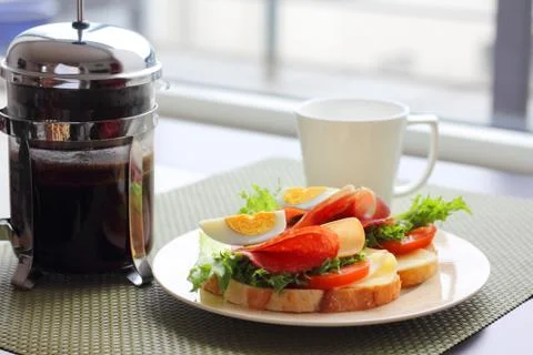 Breakfast with sandwich and coffee Stock-Fotos