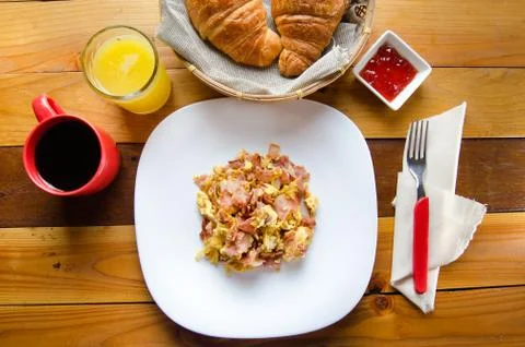 Breakfast scrambled eggs with ham Stock Photos