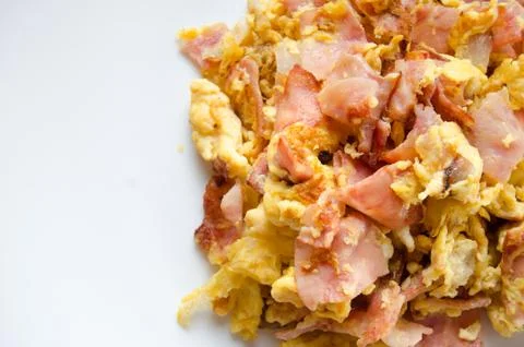 Breakfast scrambled eggs with ham Stock Photos