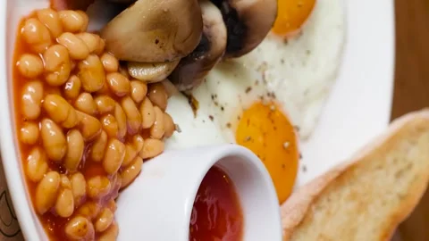 Breakfast of scrambled eggs mushrooms Stock Footage 263730070