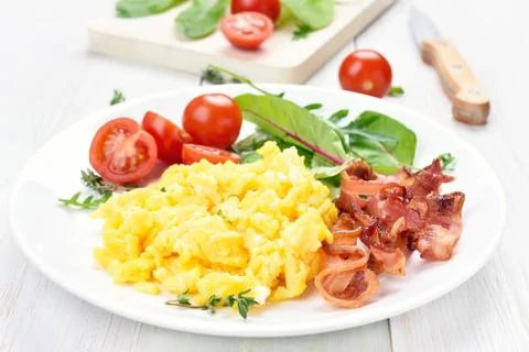 Breakfast with scrambled eggs Stock Photos