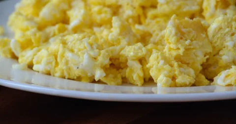 Breakfast Scrambled Eggs Served on White Plate Stock Footage 114735463