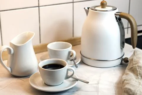 Breakfast served on the kitchen table Stock Photos