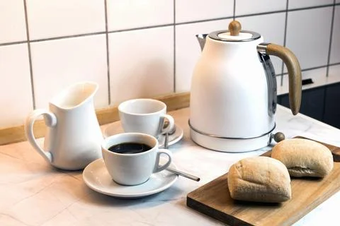 Breakfast served on the kitchen table Stock Photos