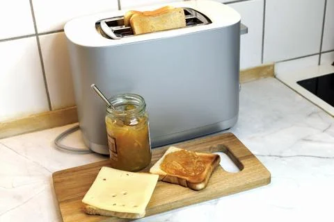 Breakfast served on the kitchen table Stock Photos
