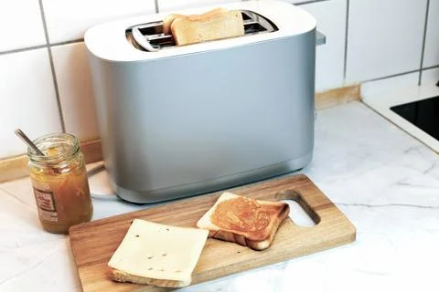 Breakfast served on the kitchen table Stock Photos