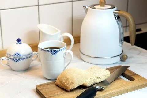 Breakfast served on the kitchen table Stock Photos