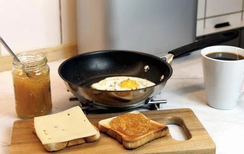 Breakfast served on the kitchen table Stock Photos