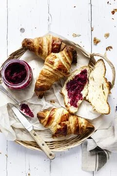 Breakfast set flat lay with croissant and raspberry jam food photography Stock Photos