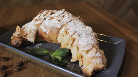 Breakfast set. Freshly baked croissants,cup of coffee Stock Footage 106949871