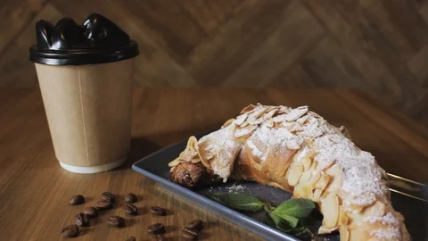 Breakfast set. Freshly baked croissants,cup of coffee Stock Footage 106949872