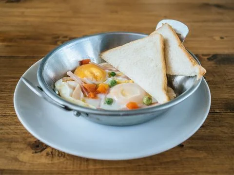 Breakfast set of fried egg and breads. Stock Photos