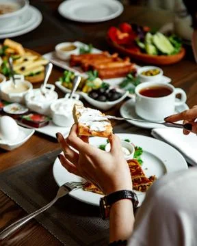 Breakfast set with various food on the table Stock Photos