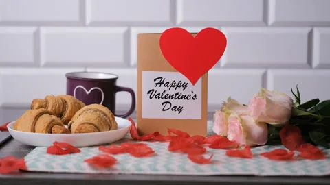 Breakfast setup for Valentines Day with flowers Stock Footage 327452938