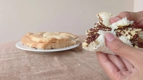 Breakfast with a slice of bread with chocolate Stock Footage 146256690