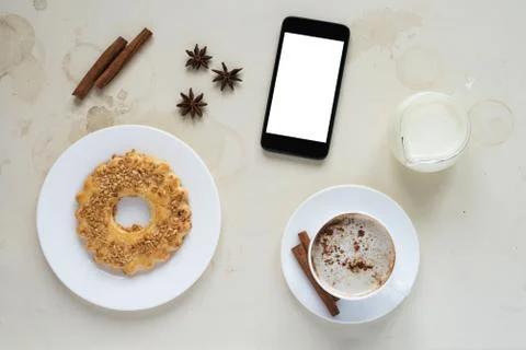 Breakfast with a smartphone Stock Photos